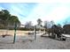 View of the community playground with a swing set, slide, and covered picnic area at 652 Marion Hills Way, Knightdale, NC 27545