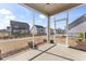 A screened porch overlooking the backyard at 652 Marion Hills Way, Knightdale, NC 27545