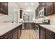 Beautiful gourmet kitchen featuring stainless steel appliances, granite counters, and stylish backsplash at 736 Wickham Ridge Rd, Apex, NC 27539