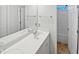 Bright bathroom featuring a large mirror, vanity, and tub/shower combo at 8209 Rolling Glenn Dr, Raleigh, NC 27616