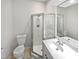 Bathroom with tiled floor, shower and vanity with sink at 8209 Rolling Glenn Dr, Raleigh, NC 27616