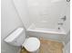 Bathroom with toilet and tub/shower combo at 8209 Rolling Glenn Dr, Raleigh, NC 27616