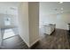 Bright, open-concept kitchen featuring stainless steel appliances and a granite-topped island at 83 Commons Cir # 236, Clayton, NC 27520