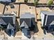 Aerial view of a home, featuring a well-maintained lawn, a driveway, and a neatly organized neighborhood at 917 Sequoia Ridge Dr, Fuquay Varina, NC 27526