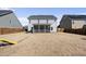 View of the backyard, showing the screened-in porch and the fenced-in yard at 917 Sequoia Ridge Dr, Fuquay Varina, NC 27526