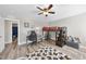 room with loft bed, study area and toy storage with hardwood floors at 917 Sequoia Ridge Dr, Fuquay Varina, NC 27526