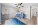 This room features a loft bed with slide, toy storage and natural light at 917 Sequoia Ridge Dr, Fuquay Varina, NC 27526