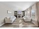 Bright living room with two couches, fireplace, built in cabinets, and lots of natural light at 917 Sequoia Ridge Dr, Fuquay Varina, NC 27526