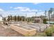 Community garden with raised beds and a tool shed, encouraging sustainable living at 1003 Branwell Dr, Durham, NC 27703