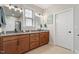 Main bathroom featuring granite countertops and double sink vanity at 1003 Branwell Dr, Durham, NC 27703