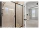 Modern shower stall with tile and glass door in the primary bathroom at 1003 Branwell Dr, Durham, NC 27703