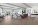 Bright, open living room with hardwood floors, modern furniture, and a sliding glass door to the outside at 1237 S Blount Street # 201, Raleigh, NC 27601