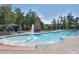 Outdoor community pool featuring a fountain and comfortable seating areas at 124 Currituck Ln, Durham, NC 27703