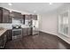 Well-equipped kitchen with stainless steel appliances and ample counter space at 124 Currituck Ln, Durham, NC 27703