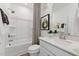 Bright bathroom with a tub/shower combo and vanity with cultured marble countertop at 1259 Shaw View Alley # 101, Raleigh, NC 27601