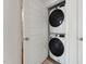 Efficient laundry space featuring a stacked washer and dryer at 1259 Shaw View Alley # 101, Raleigh, NC 27601