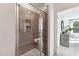 Shower stall with glass door and tile surround, adjacent to Primary bedroom at 1259 Shaw View Alley # 101, Raleigh, NC 27601