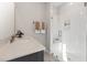 Modern bathroom with a glass-enclosed shower, sleek vanity, and contemporary fixtures at 1259 Shaw View Alley # 201, Raleigh, NC 27601