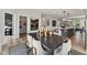 Bright dining room featuring a modern table set, elegant decor, open to the kitchen, and stylish flooring for a comfortable atmosphere at 1259 Shaw View Alley # 201, Raleigh, NC 27601