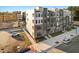 Modern townhome with brick and siding facade, showcasing contemporary design and inviting curb appeal in a residential area at 1259 Shaw View Alley # 201, Raleigh, NC 27601