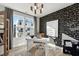 Stylish home office with modern desk, chic wallpaper, and a cozy chair, creating an inspiring workspace at 1259 Shaw View Alley # 201, Raleigh, NC 27601