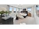 Serene main bedroom with ample natural light, stylish decor, and a comfortable seating area at 1259 Shaw View Alley # 201, Raleigh, NC 27601