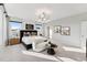 Inviting main bedroom with neutral tones, modern lighting, and a cozy seating nook at 1259 Shaw View Alley # 201, Raleigh, NC 27601