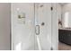 Modern shower features white subway tile, a built-in niche, and a sleek glass door at 1259 Shaw View Alley # 201, Raleigh, NC 27601