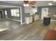 Spacious kitchen boasts stainless steel appliances, white cabinets, and ample counter space at 136 Dogwood Trl, Wendell, NC 27591
