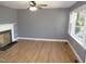 Spacious living room featuring hardwood floors and a fireplace at 136 Dogwood Trl, Wendell, NC 27591
