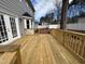 Spacious backyard deck with gray siding, perfect for outdoor entertaining at 208 Lawrence Rd, Cary, NC 27511