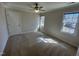 This bedroom has great natural light, with a ceiling fan for added comfort, and neutral walls at 208 Lawrence Rd, Cary, NC 27511