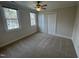 This bedroom features two windows and a large closet, providing ample natural light and storage at 208 Lawrence Rd, Cary, NC 27511