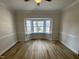Dining room with a ceiling fan and a large bay window at 208 Lawrence Rd, Cary, NC 27511