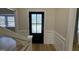 Elegant front entry featuring a black door with decorative glass panels at 208 Lawrence Rd, Cary, NC 27511