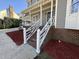 Inviting front porch with decorative railings and brick accents at 208 Lawrence Rd, Cary, NC 27511