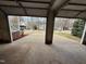 View from garage showing neighborhood street with well-maintained lawns and manicured trees at 208 Lawrence Rd, Cary, NC 27511