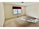 Bedroom awaiting new flooring and design ideas, ready for customization at 2118 N Woodland Rd, Henderson, NC 27536