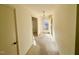 Bright hallway showcasing an entry to the home with natural light at 2118 N Woodland Rd, Henderson, NC 27536