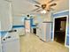 The kitchen has white cabinets, appliances, and an open layout at 2118 N Woodland Rd, Henderson, NC 27536