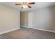 Comfortable bedroom with neutral colors and a ceiling fan at 215 Oak Island Ct, Garner, NC 27529