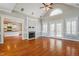 Spacious living room with vaulted ceilings, fireplace, and hardwood floors at 215 Oak Island Ct, Garner, NC 27529