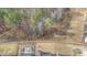 Aerial view of the backyard and surrounding wooded area at 2212 Jollay St, Durham, NC 27703