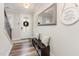 Welcoming entryway with a bench, mirror, and decorative accents at 2212 Jollay St, Durham, NC 27703