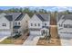 Charming two-story home featuring a stone-accented front, well-manicured landscaping, and a two-car garage at 2212 Jollay St, Durham, NC 27703