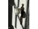 Close-up of a vintage crystal doorknob with detailed metal hardware at 2409 Shenandoah Ave, Durham, NC 27704