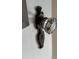 Up close view of a classic crystal doorknob at 2409 Shenandoah Ave, Durham, NC 27704