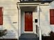 The front entrance showcases a wooden door and painted columns at 2409 Shenandoah Ave, Durham, NC 27704