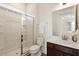 Bathroom features a glass-enclosed shower, vanity, and modern toilet at 244 Bevis Marks Dr, Fuquay Varina, NC 27526