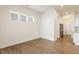 Dining area showcasing hardwood floors, recessed lighting and three windows at 244 Bevis Marks Dr, Fuquay Varina, NC 27526